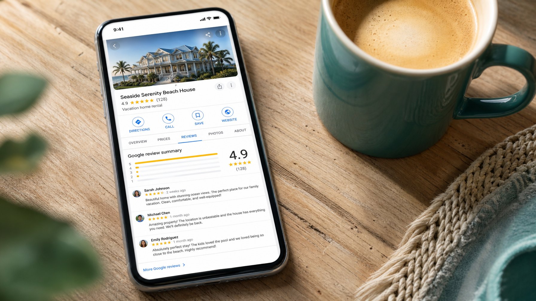 Smartphone showing a vacation rental Google Business Profile listing with a 4.9-star rating and positive guest reviews on Google Maps, on a wooden desk