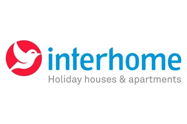 Houfy Integrates with Interhome: Enhancing the Booking Experience