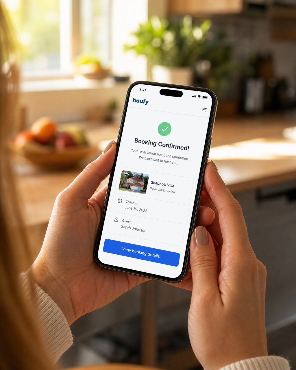 Host receiving first direct booking confirmation notification on smartphone after listing vacation rental on Houfy