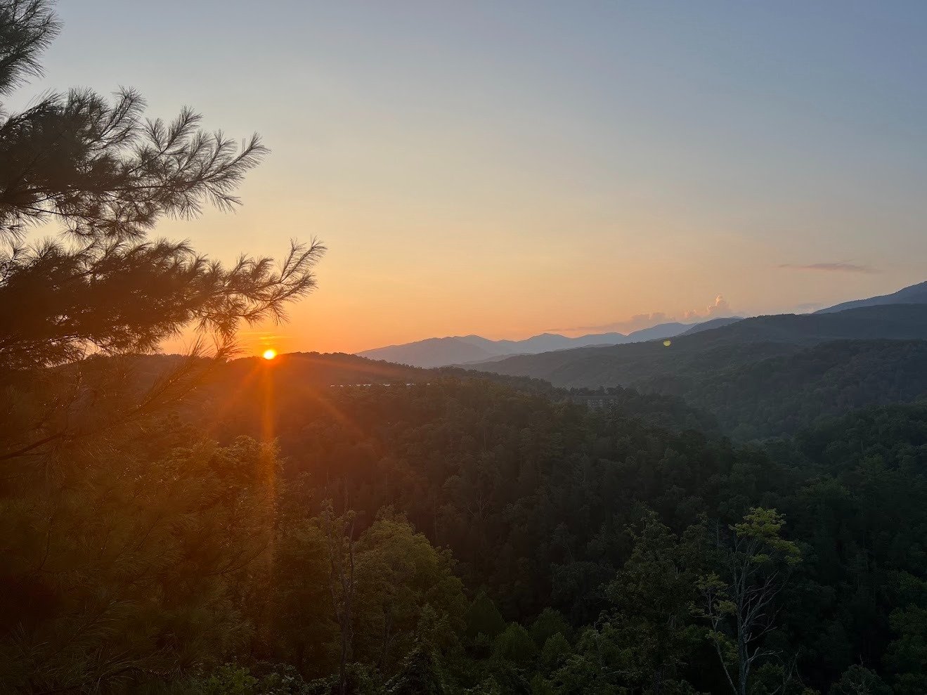 Sunset views from our Gatlinburg cabin — winding down in the Smoky Mountains after a full family day of adventure