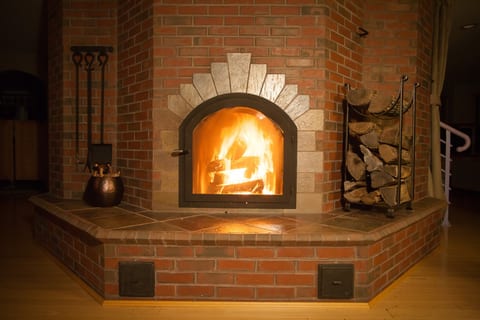 Escape to Cozy Comfort: Magical Two-Story Masonry Heater
