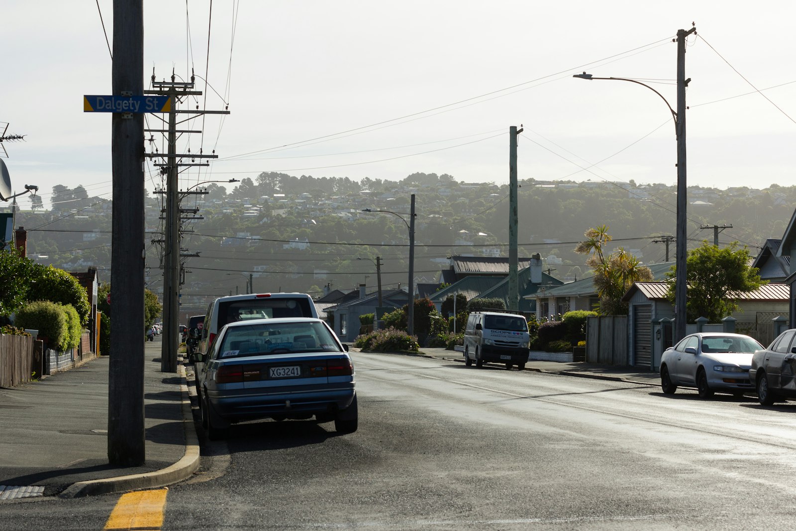 Cars parked along the kerb on a residential street