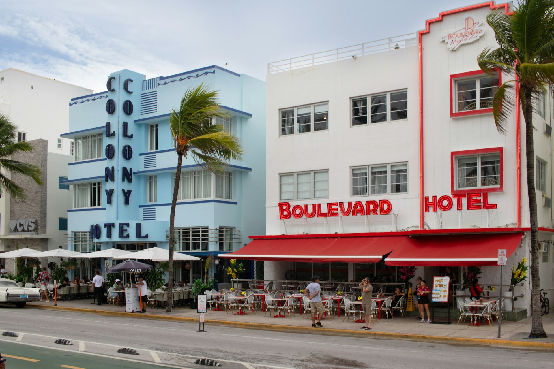 Green and cream Art Deco hotels and palms on Ocean Drive