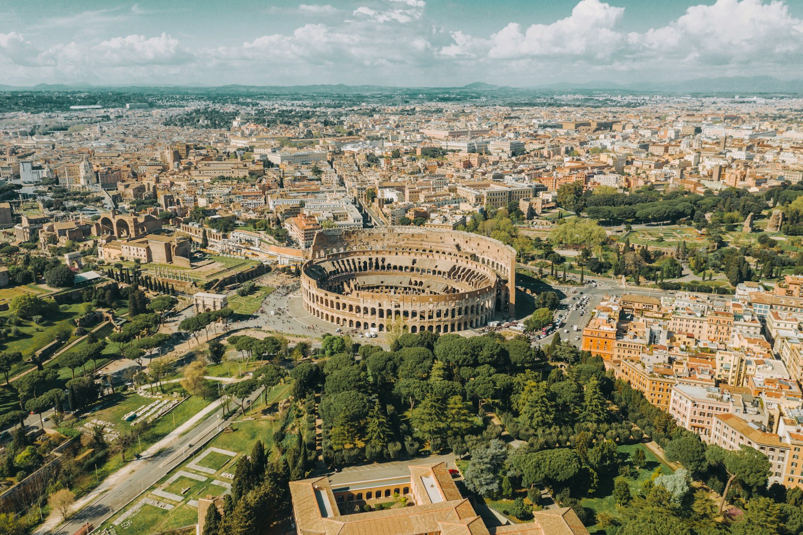 Aerial view of the Colosseum and the surrounding streets of Rome
