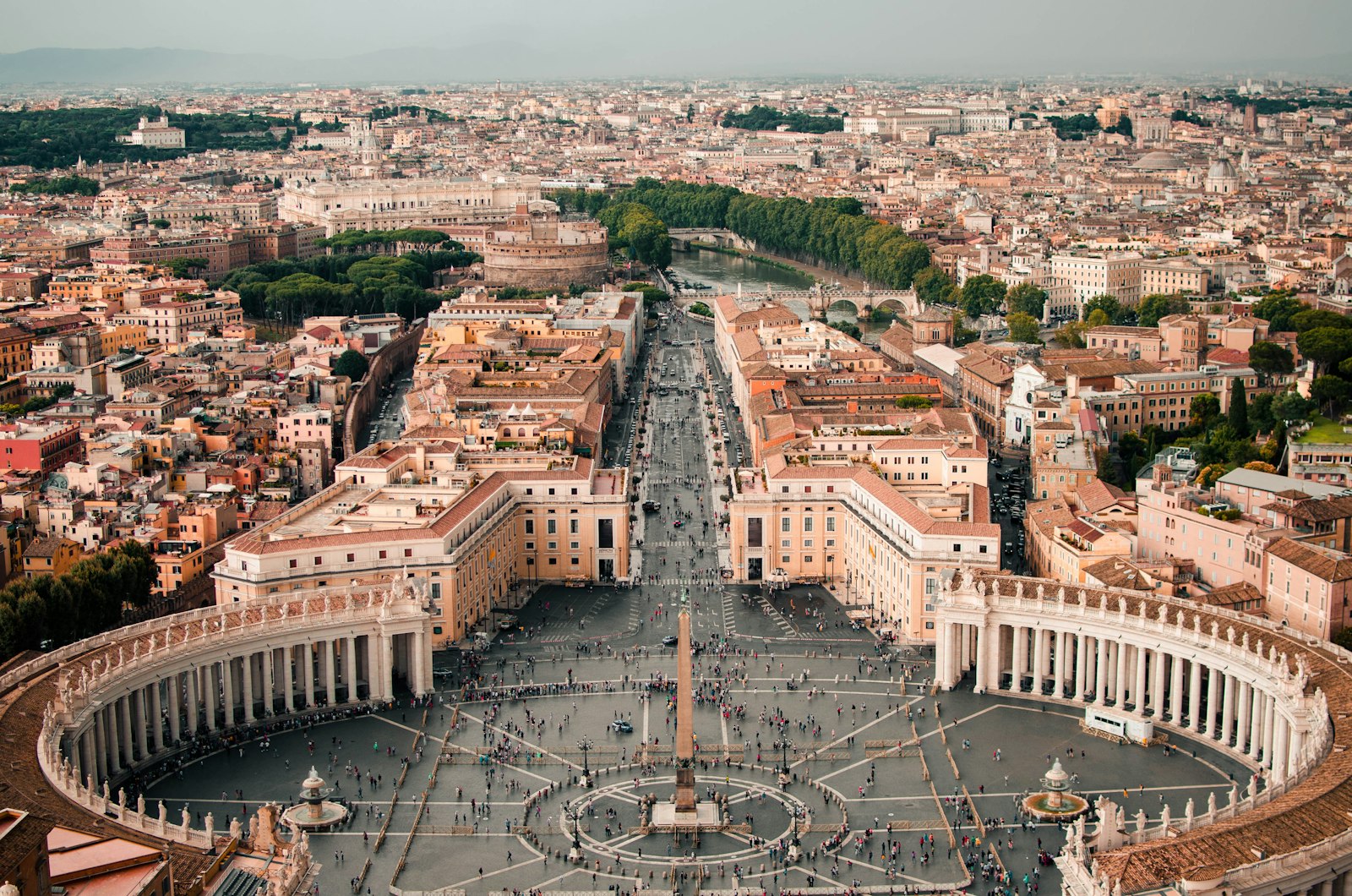 View over St. Peter's Square and the Rome rooftops from the top of the basilica