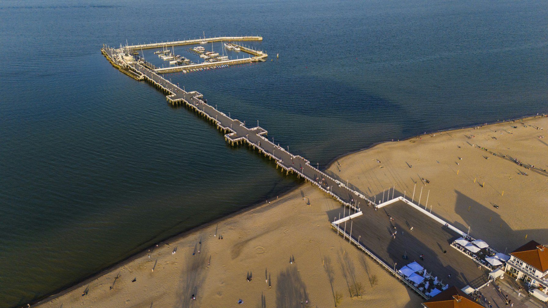 The long wooden pier at Sopot seen from the air, stretching out into the Baltic