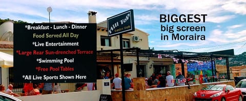 Hilltop Gastro Pub, Carrer Móstoles 33, Moraira, +34 965744366. Great terrace at the back of the restaurant, with pool to enjoy !