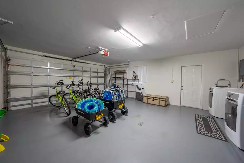 Garage with bikes and beach equipment