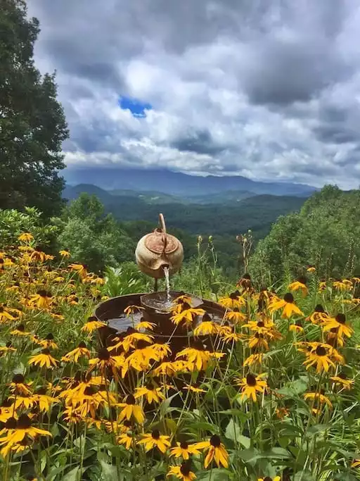 SUMMER - our handcrafted iron teapot fountain. Enjoy the sound of running water with a VIEW - HAWKS VIEW HOUSE - Bakersville