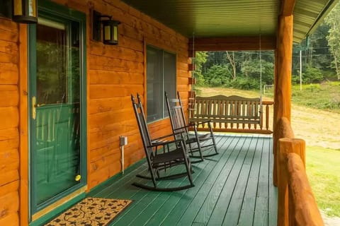 Seating for 10 on the front porch - 8 rocking chairs + 1 porch swing.