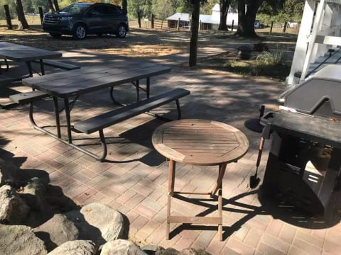 Brick patio with grill for entertaining and enjoying the beautiful views.