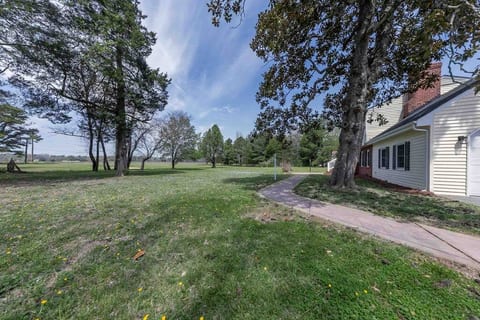 Spacious yard. The home sits on a six acre parcel