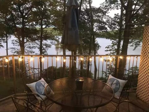 Enjoy our lakeside balcony with white lights