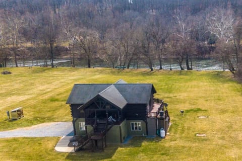 Just a few feet from the mighty Shenandoah River, tons of open lawn for running and playing