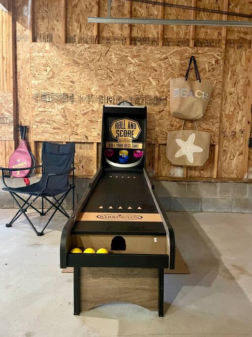 game room with skee ball and packed beach bags all ready for the pool (diving sticks, floats, toys and snorkels) - Northwoods WI: ATV, lake, pool, golf, hike, ski - Danbury