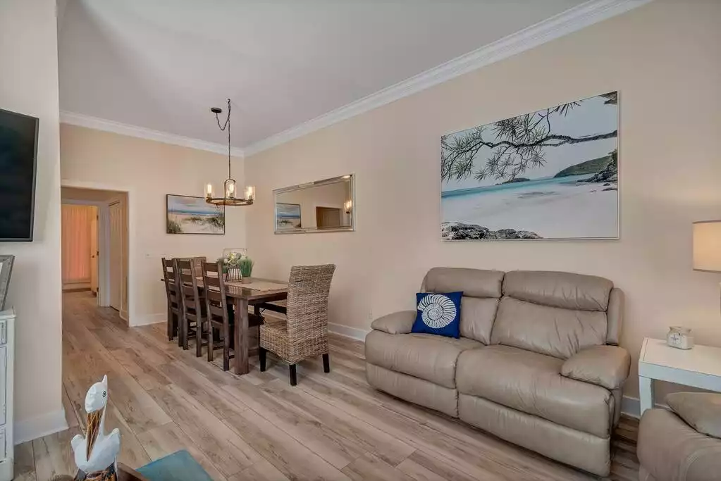 Large Kitchen table with seating for 9 in an open seating area in between the living room and kitchen. Large Kitchen table with seating for 9 in an open seating area in between the living room and kitchen. - Beautifully Updated 5 BR with Pool on Beach! - Panama City Beach