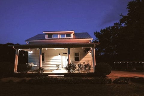 After a wonderful day enjoying the peaceful calming Phoenix House enjoy dusk on the front porch swing or rocking chairs.