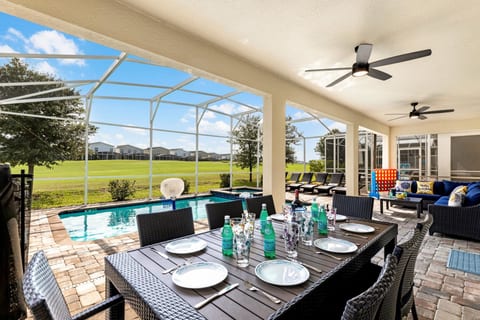 Covered lanai, Outdoor dining table seats 8, outdoor sectional & 6 lounge chairs and that fantastic view!
