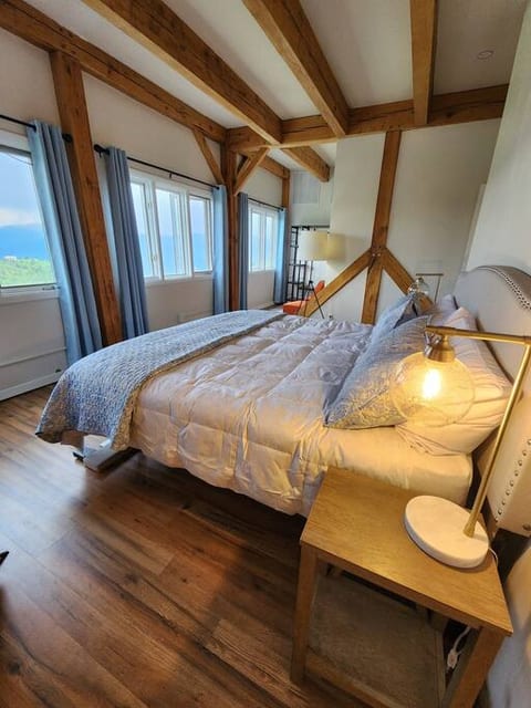 "Master" bedroom with sitting area and gorgeous Mt. Evans views