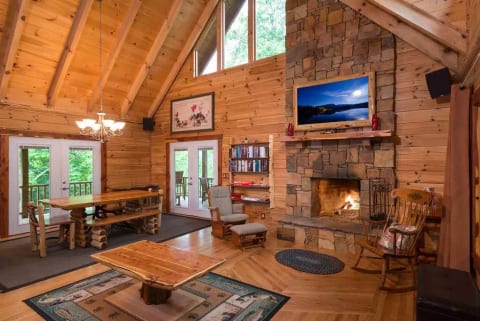 View of living room and adjacent dining area.