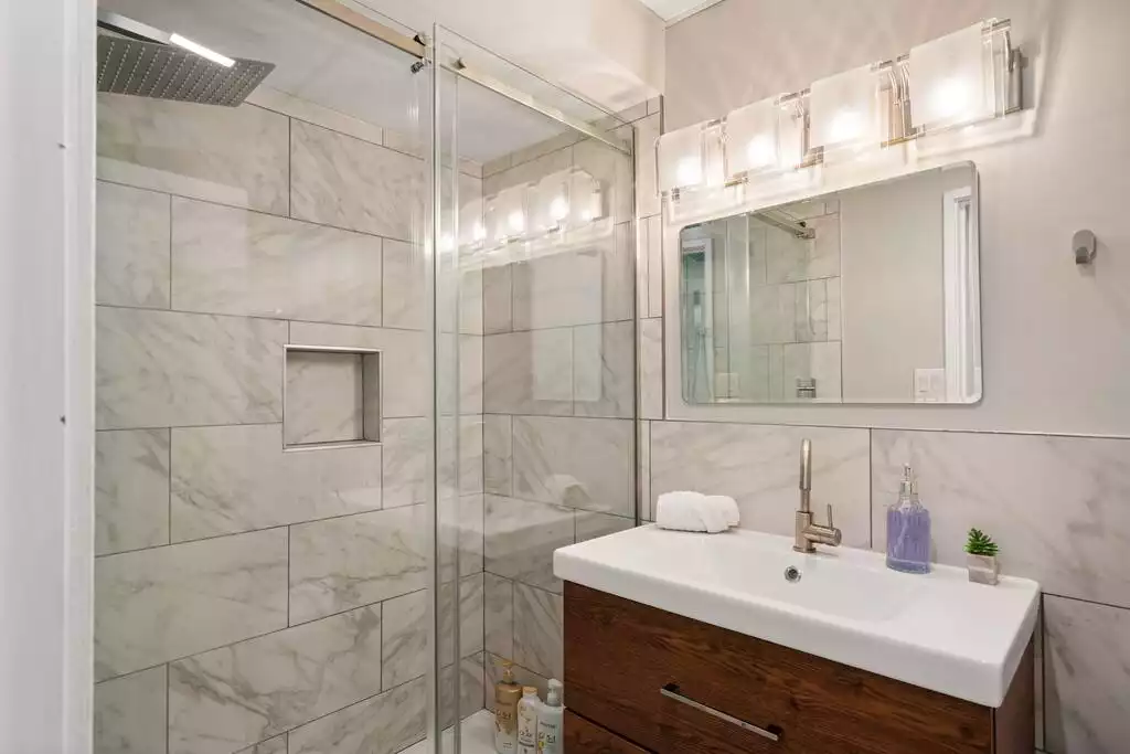 First bath on the lower level, right across the king bedroom First bath on the lower level, right across the king bedroom - House over The Pond w/ Game Rooms, Views - Basye