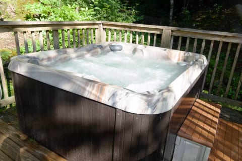Hot tub along side babbling creek.