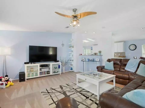 Soft leather seating with 2 recliners & rocking, reclining chair. Lots of DVD