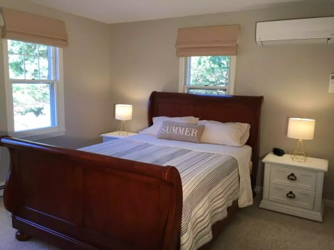 Comfortable and calming first floor bedroom with queen bed.