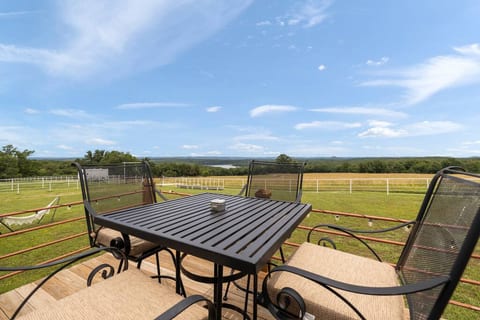 The deck offers a panoramic 180-degree view of 20,000 acres of serene, private, and tranquil beauty. Enjoy misty sunrises, stunning sunsets, or simply relax and take in the views of Table Rock Lake and the Ozark Mountains.