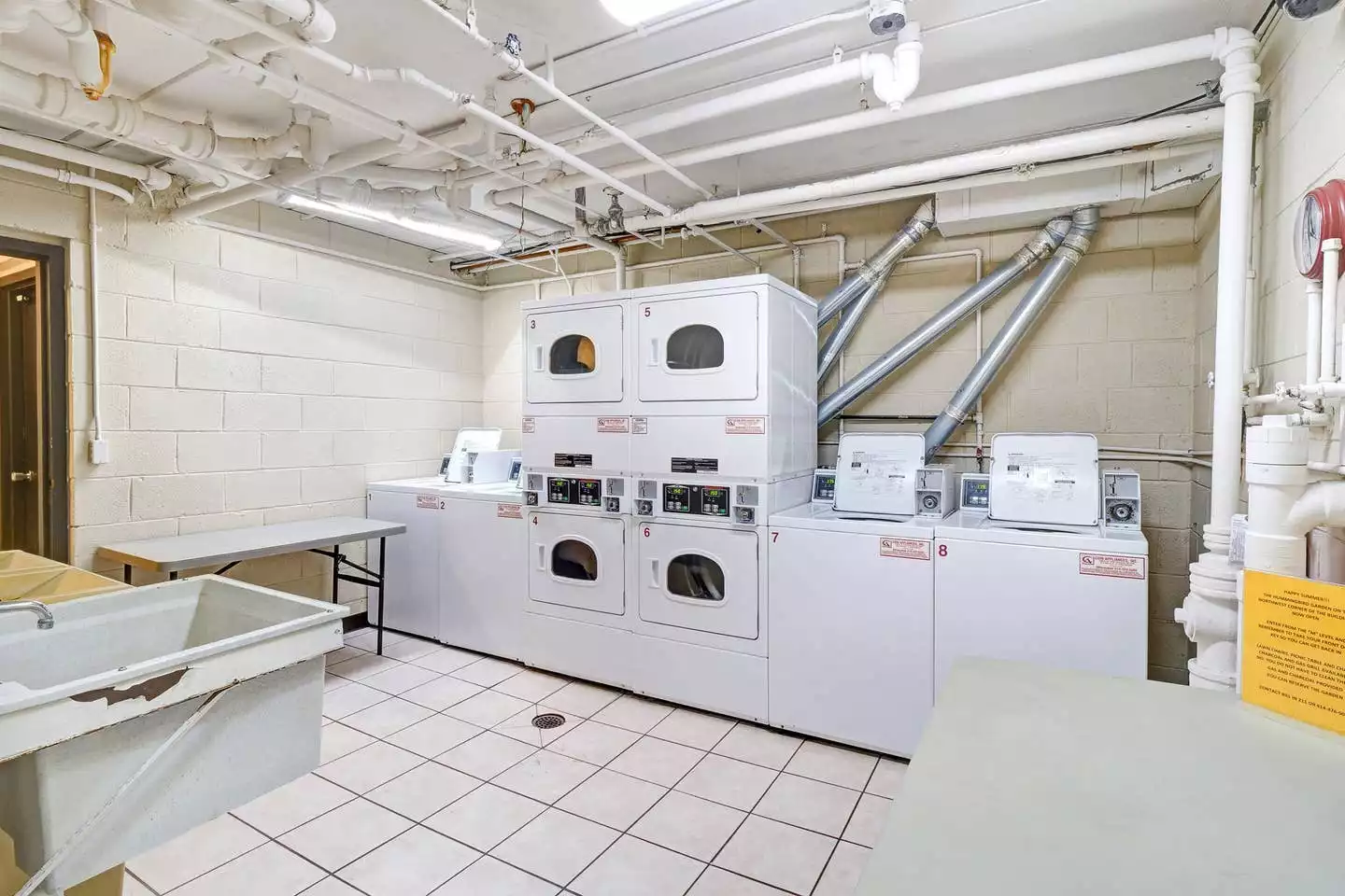 Coin operated laundry in the basement, right next to the underground parking.