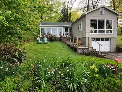 You will enjoy a garden front yard to relax and enjoy lake view in adirondaks.