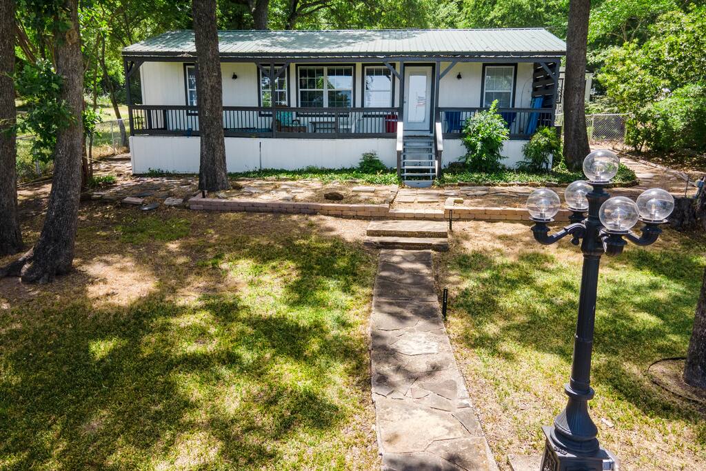 Enjoy your morning coffee on our long back porch or patio.  