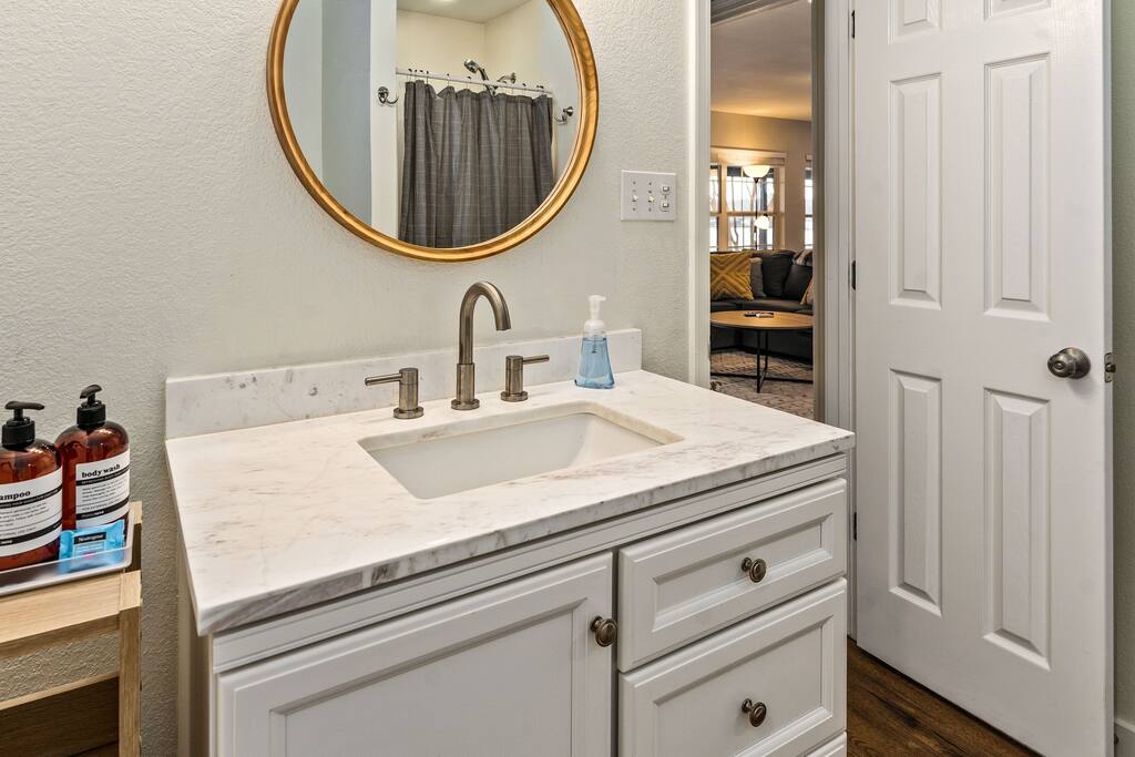 This bathroom can be accessed from the primary bedroom or entryway.
