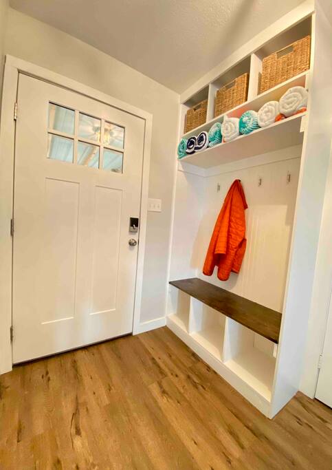 Cute little area inside the front door to hang your jacket or lake towels!