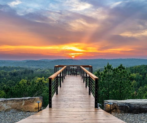 It doesn't get more epic than this! When you walk out on the sky deck, the sky is yours. It's perfect for morning coffee, evening meals, watching the sunset or for stargazing. Plus we made the lighting optional to preserve your night vision.
