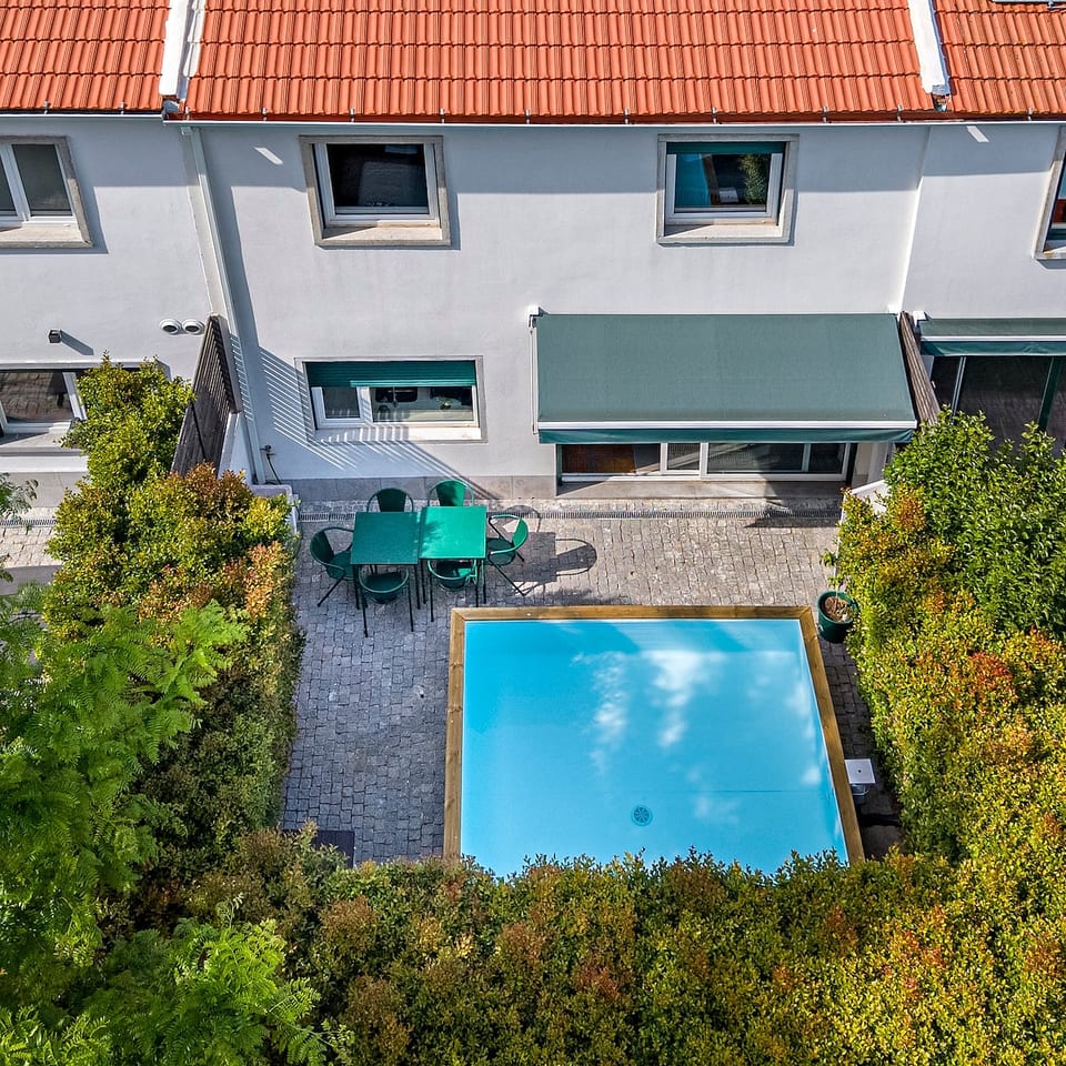 Outdoor Oasis: Dive into relaxation by the glistening pool and enjoy al fresco dining under the sun!