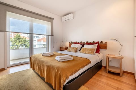 Bedroom: Bright and welcoming retreat with stylish decor and a view to inspire relaxation!