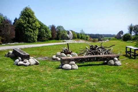 Outdoor seating area with views towards the Tasman Sea.