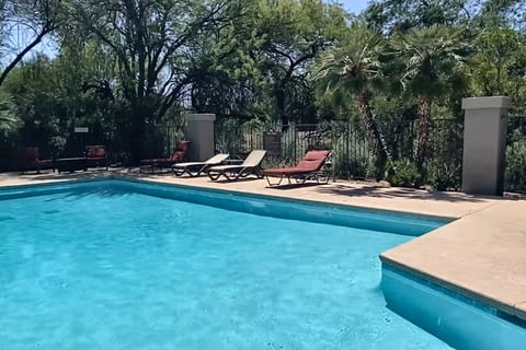 Relax and unwind in our heated pool #3 (of 3), complete with a spa, grill, fire pit , and ample seating for everyone. Enjoy outdoor entertaining and create lasting memories.