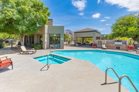 Relax and unwind in our heated pool #2, complete with a spa, grill, firepit, and ample seating for everyone. Enjoy outdoor entertaining and create lasting memories.