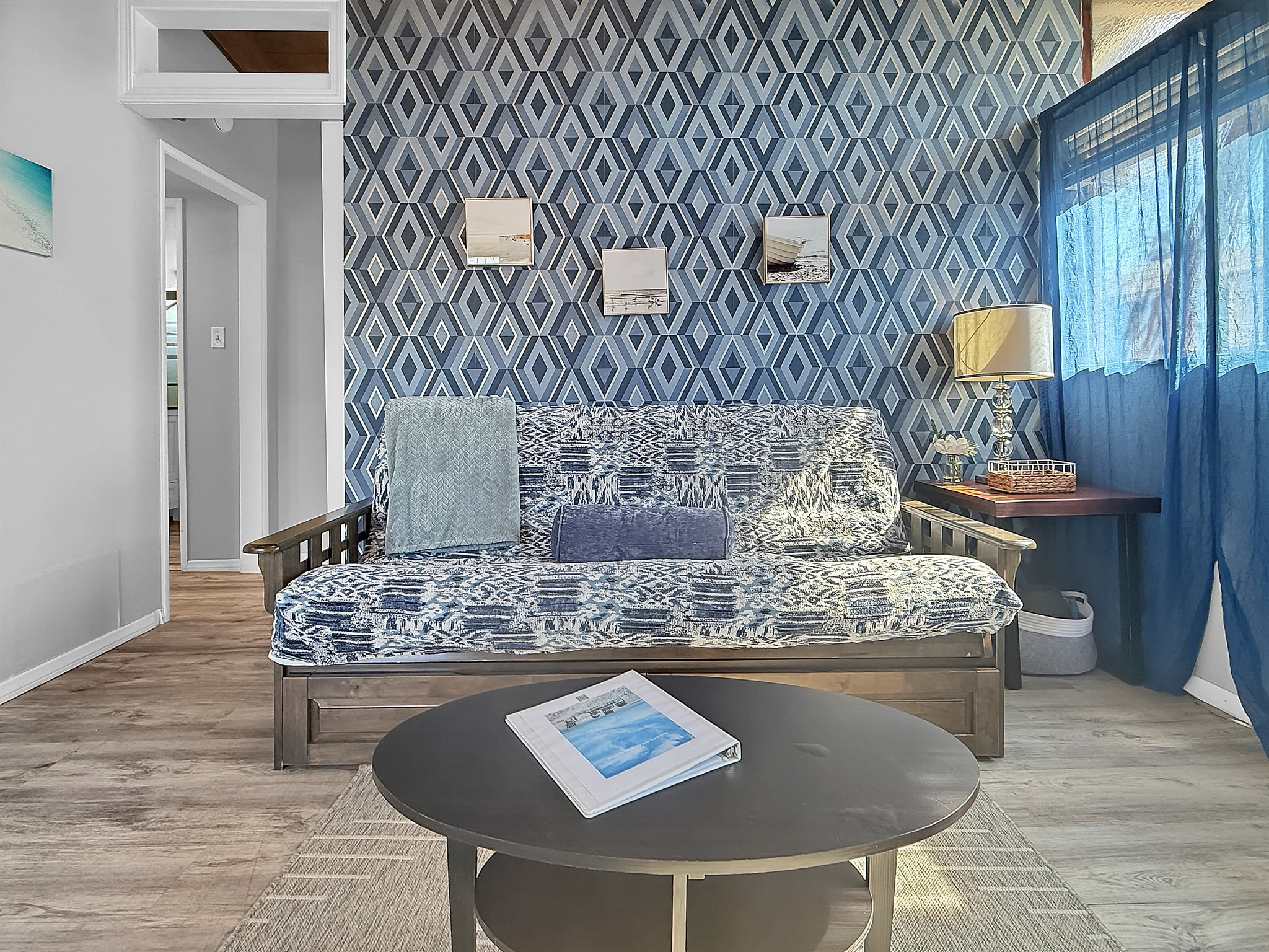 Relax in the cozy living room, complete with a full futon and smart TV, perfect for winding down after a day in the sun