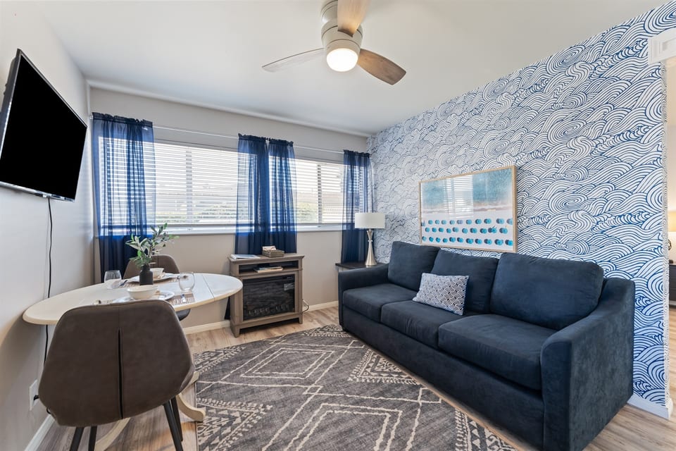 Living Room with Smart TV, Dining Table, Sofa Sleeper