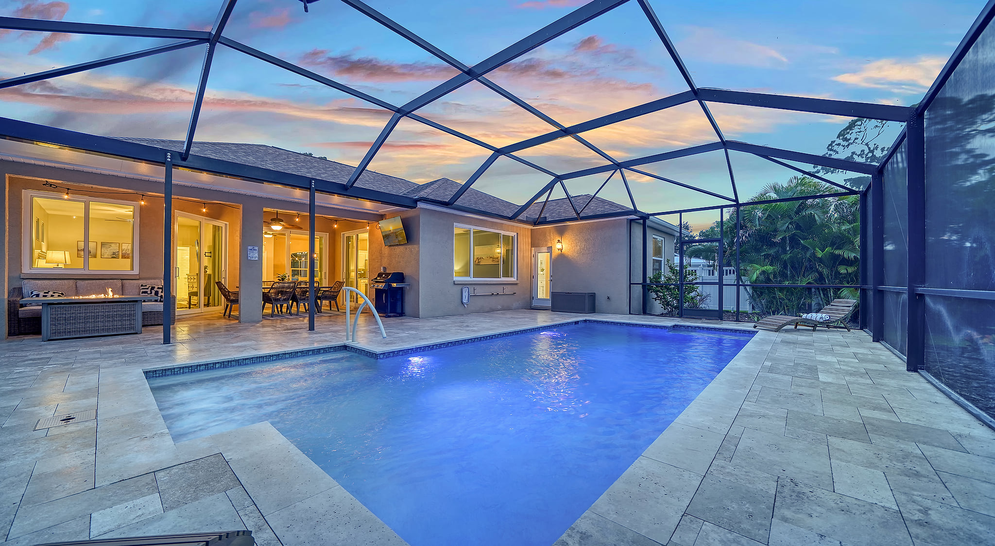 Dive into your own private paradise! Welcome to your "Happy Place" with a private fully-fenced backyard, surrounded by mature palm trees and a spacious HEATED SALTWATER POOL, plus tons of color changing lights!
