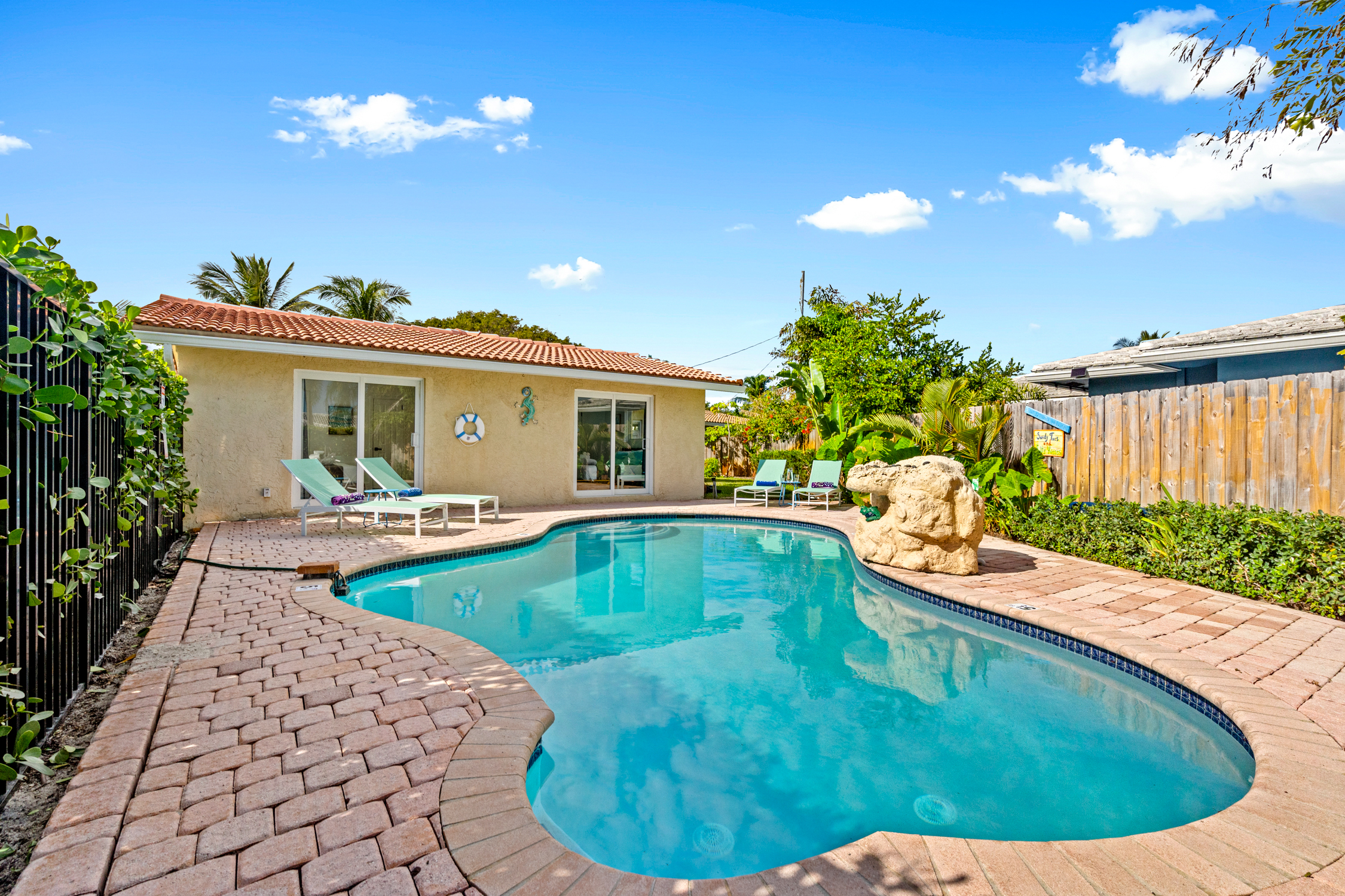 Amazing heated private pool with water fountain and loungers