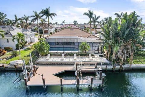 Enjoy the Waterfront Bliss with a Personal Boat Dock and Sun Deck with Stunning Scenic Views.