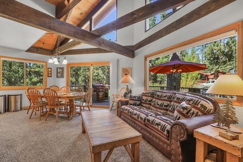 Large windows bringing in natural light and Sierra views. Slider provides easy access from the kitchen to the deck.