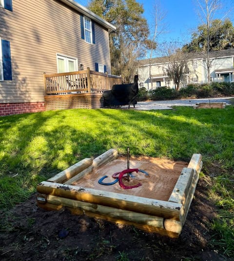 Horseshoe pit in the back yard.