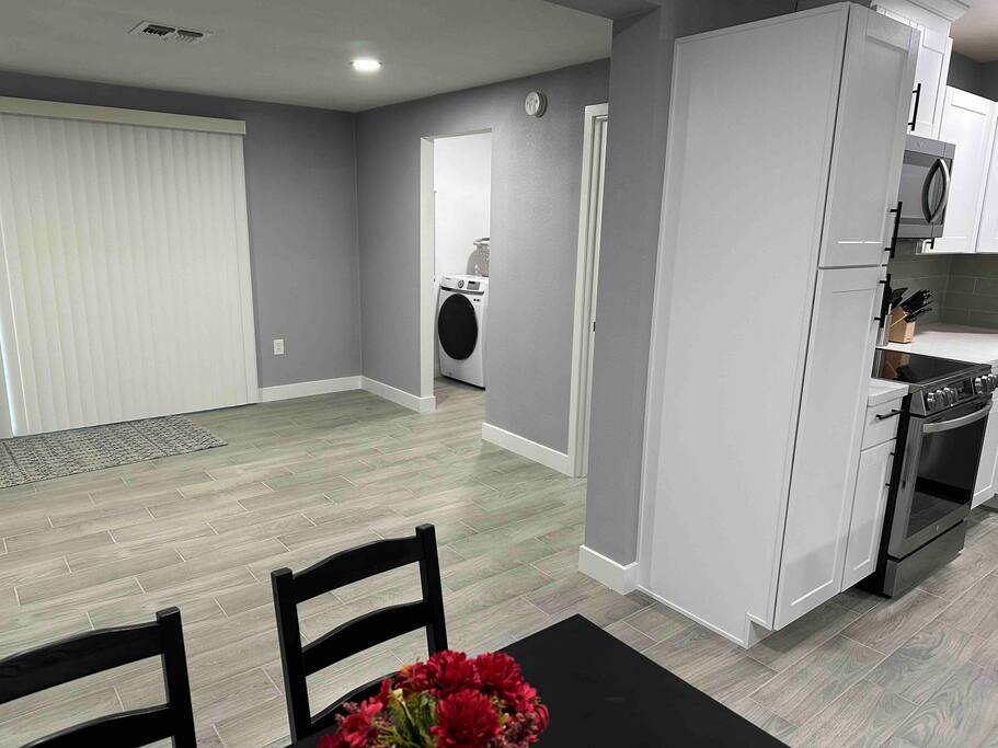 Looking from eating area towards laundry room.