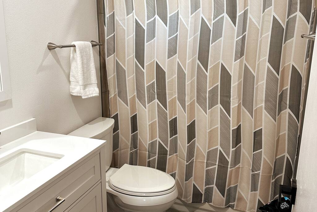 Guest bathroom with tub.