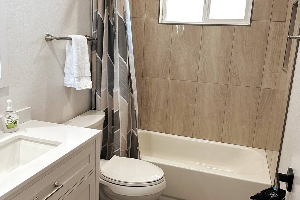 Guest bathroom with tub.